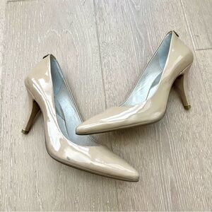 Like new Michael Kors nude heels/pumps. Size 7.5 but run little small.